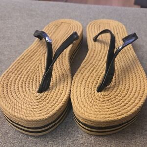 Woven Platform Flip-Flop Sandals in Tan with Black Straps